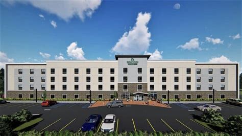 Red Roof unveils new HomeTowne Studios extended stay prototype.